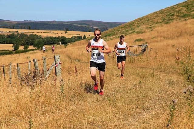 Hot weather on a hard baked course for the hill race. Picture: John Martin Lang