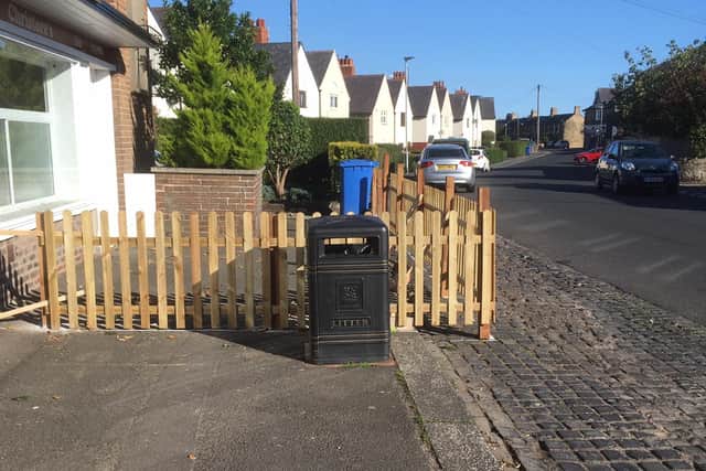 The fence that was put up outside a property on Victoria Terrace has now been removed but owners Stephen and Chrstine Williams say they have a legal right to have it.
