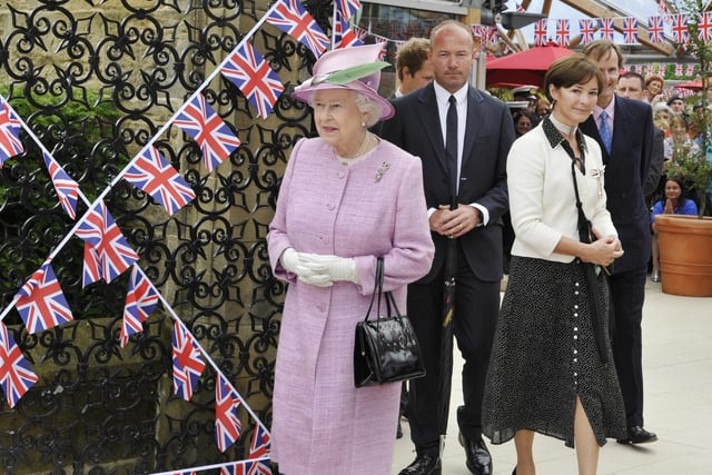 The Queen with Alan Shearer and the Duke and Duchess of Northumberland at The Alnwick Garden in 2011.