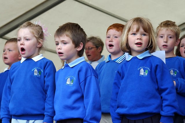 Pupils from Ellingham First School sang and played instruments at a POW party held at Doxford Hall in June 2004.