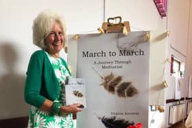 Virginia Kennedy with her new book, March to March.