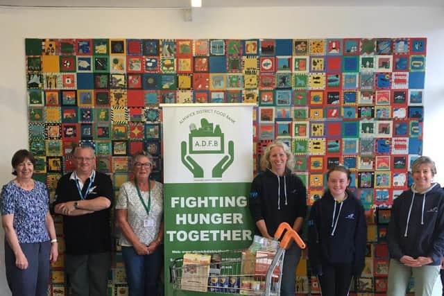 Alnwick District Triathlon Club raised over £1,000 for Alnwick District Food Bank.