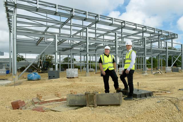 The new Sterilisation Unit facility takes shape on the grounds of Northumbria Specialist Emergency Care Hospital in Cramlington, discussing the project were Matt McGrady, Finance Director of lead contractor Merit (right) and Northumbria Healthcare Trust Project Director, Owen Cusack.