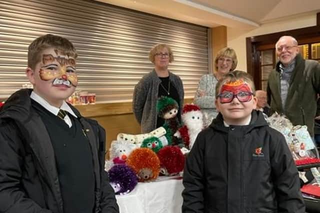 Youngsters Kyle and Connor Chambers pictured during the fair at the Scremerston Knit and Knatter group’s stall.