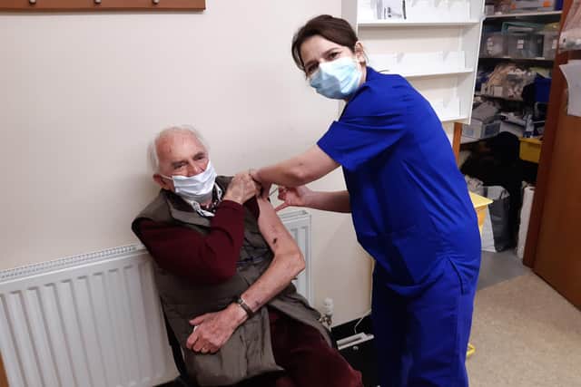 Retired doctor James Mitchell receives his Covid-19 vaccine in Berwick.