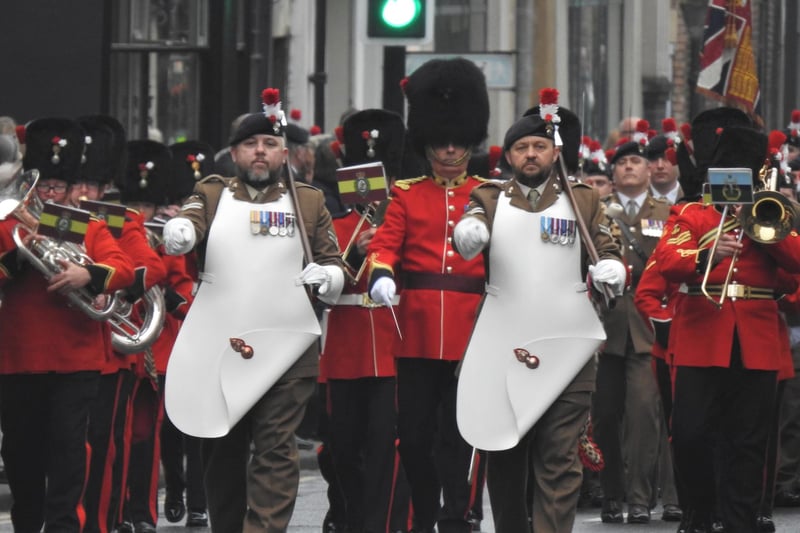 The parade marches through Morpeth town centre.