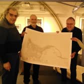 Alnwick Civic Society chairman Peter Reed (far left) donating one of the large-scale maps to Bailiffgate Museum and Gallery chair Jean Humphrys.