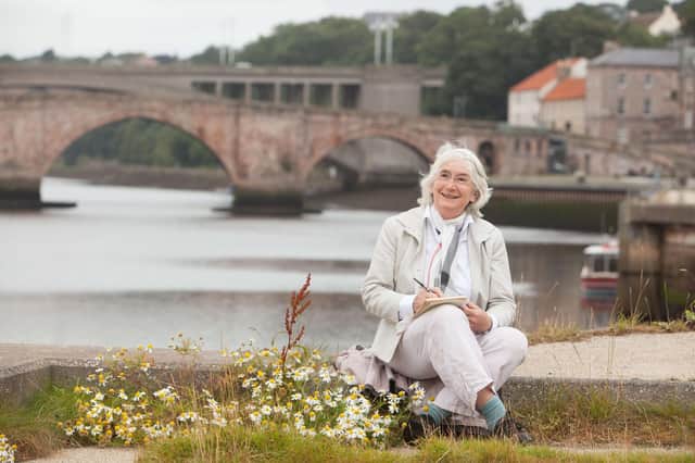 Picture of Dr Sarah Watkinson writing in Berwick by Sarah Jamieson (Pictorial Photography).