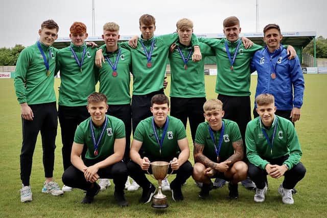 Blyth Spartans under-19s with the trophy and their winners medals. Picture: Blyth Spartans