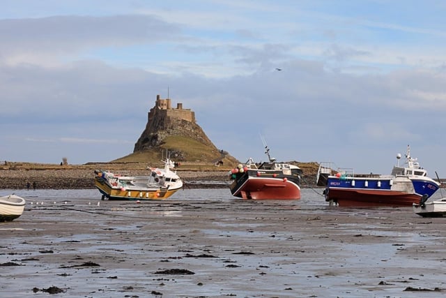 Holy Island's picture-perfect views make it a great spot to visit. With popular cafes and pubs and many walking routes, the island is ideal for a day trip or a staycation.