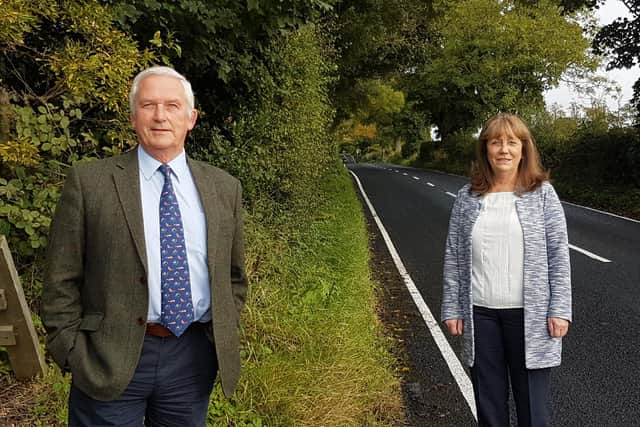 Council leader Glen Sanderson and Cllr Eileen Armstrong by a stretch of newly surfaced road near Whalton.