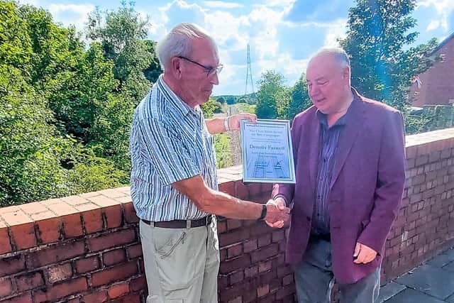 Dennis Fancett collects his Railfuture award at Seaton Delaval. Picture: Dave Shaw