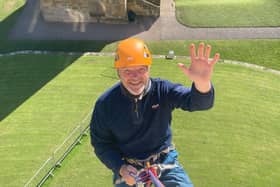 Abseiling off Alnwick Castle.