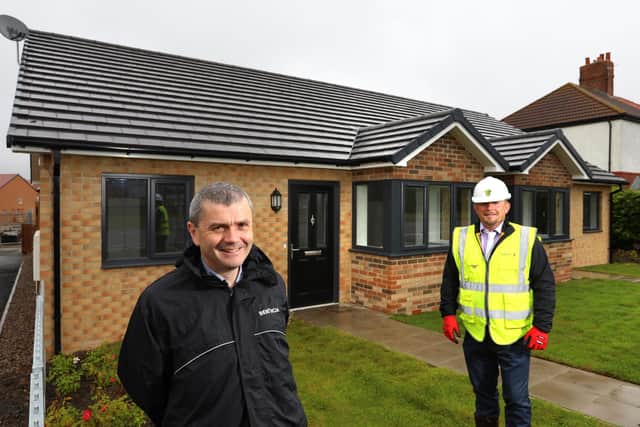 Michael Farr, Bernicia Executive Director of Assets and Growth (left), and Ian Avis, Tolent Construction Manager, outside one of the new bungalows at the Rosebrough scheme.