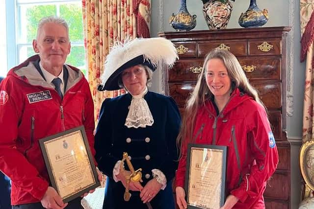 Andrew Miller and Ninette Edwards with their awards from High Sheriff Joanna Riddell.