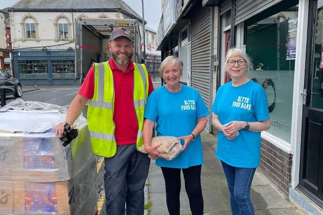 Lee Roden of Moody Logistics delivers breakfast cereal and toiletries to Blyth Foodbank volunteers Wendy Hogg and Maureen Kelly. (Photo by Moody Logistics)