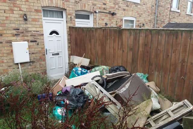 Some of the rubbish left in a garden in Chestnut Street, Ashington.