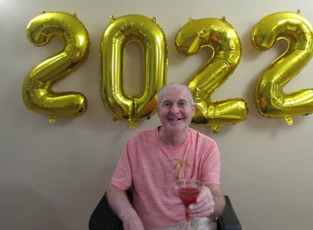 One resident at Chester Court celebrates New Year's Eve with one of the cocktails he made.
