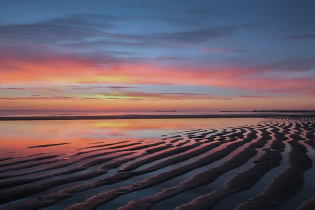 Warkworth beach at sunrise by Kenton Duffield.