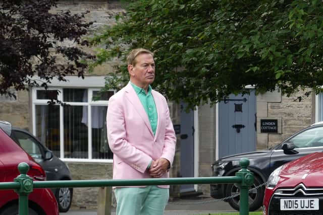 Michael Portillo by the Armstrong Cross in Rothbury. Picture: Jeff Reynalds