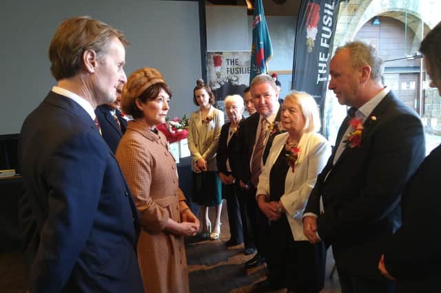 The Duke and Duchess of Northumberland with Calder Mills' family.