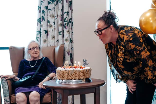 Valerie Brisbane and Bay View House administrator Suzanne Hughes do the birthday honours.