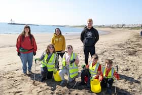 The team from The Fifth Point Diving Centre with pupils from Bishop’s Primary School at Newbiggin beach.