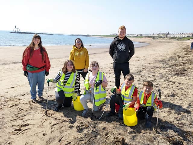The team from The Fifth Point Diving Centre with pupils from Bishop’s Primary School at Newbiggin beach.