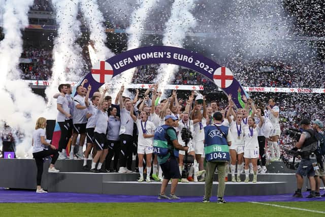 England players celebrate with the trophy following victory over Germany in the UEFA Women's Euro 2022 final at Wembley Stadium. Picture: PA.