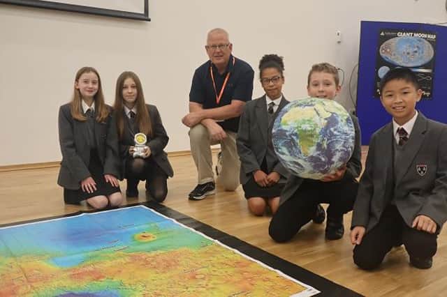 Students from Northumberland at the space talk given by Jim Christensen, a workshop leader for Aldrin Family Foundation.