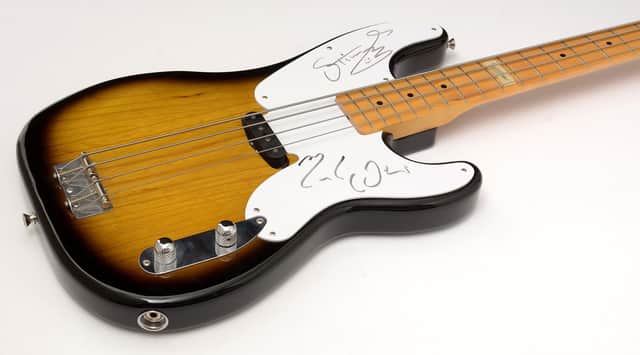 The 1951 Fender Telecaster Precision Bass Guitar signed by Sting.