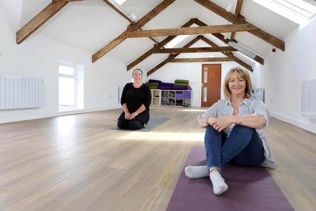 Frances Anderson (left) with Mary Ormston from Karbon Homes in the new loft studio.