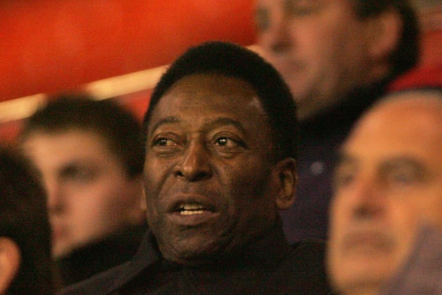 Pele in the stand, with then-Blades boss Bryan Robson in the background.