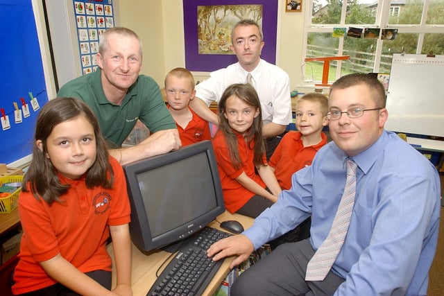 Presentation of computers to Netherton First School, from Harden Quarry at Biddlestone, in September 2004.