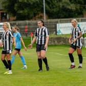 Alnwick Town Ladies players shake hands with their opponents after their cup win. Picture: John Vernon Mason