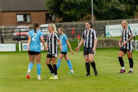 Alnwick Town Ladies players shake hands with their opponents after their cup win. Picture: John Vernon Mason