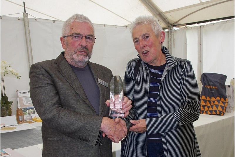 William McLaren presents the President's Trophy to Paula McEwen for her wonderful handicraft work. Picture: Tony Broom
