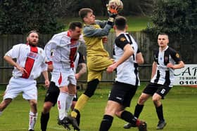 Alnwick keeper Thomas Slack in the thick of the action against Shankhouse. Picture by Steve Miller.
