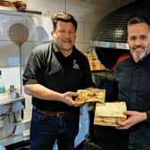 Neil Hedley, manager at The Woodfuel Centre (left) with Porky's manager Armando Fernandes. (Photo by Blyth Star Enterpises)