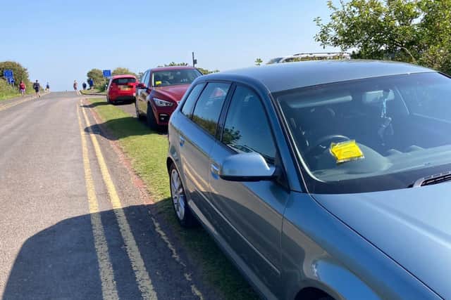 Tickets were issued by Northumberland County Council after cars parked up on the pathway outside Low Newton car park last week.