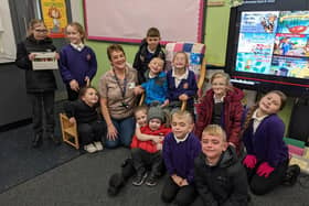 Jane Sampson, community reading worker with pupils from Grace Darling C of E Primary School’s Story Club.