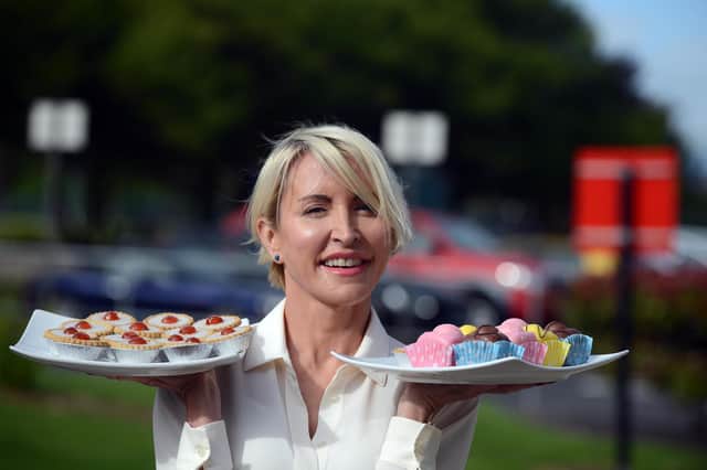Heather Mills with vegan cakes at the her Plant-Based Valley vegan food production factory event at Seaton Delaval