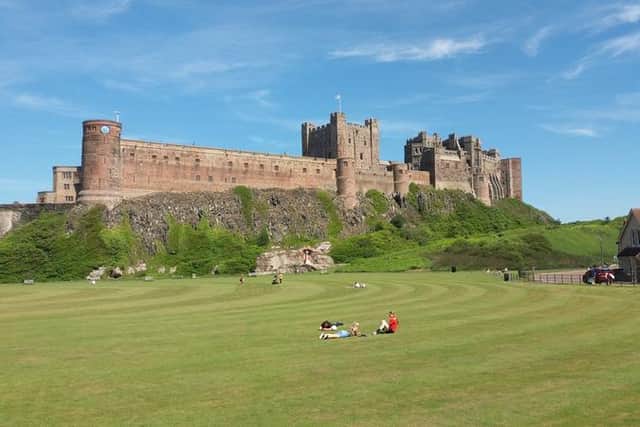 Bamburgh Castle and village green.