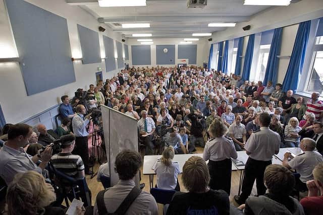 Worried locals cram into Jubilee Hall in the centre of Rothbury for a meeting with the local police for information about the search for Raoul Moat, July 8, 2010. Picture: Getty Images