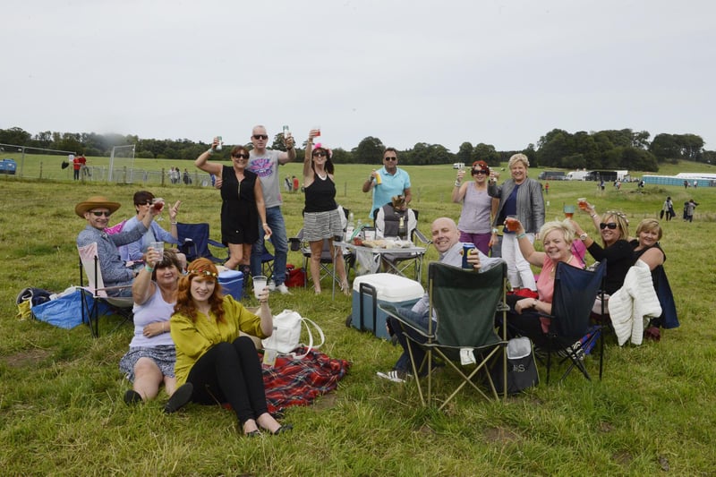 Time for a picnic in the fields outside the fencing before the start of the concert in 2015.