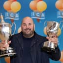 Cone or cups? Domenico Gregorio, boss of Ciccarelli, with his two trophies.