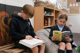 Two Belsay Primary School pupils enjoy some reading time.