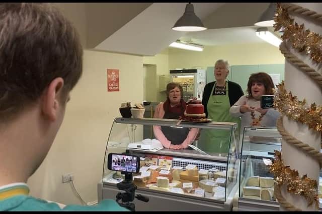Karen the Mam filming in the Cheese Room at Alnwick deli.