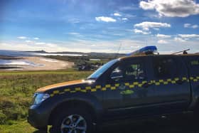 Howick Coastguard Rescue Team at Low Newton, where a surfer was treated after being saved by the sea by the RNLI.