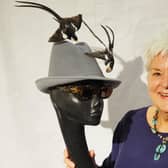 Bailiffgate Museum volunteer Sheila Starks with a widow birds hat borrowed from Stella Tennant’s collection.